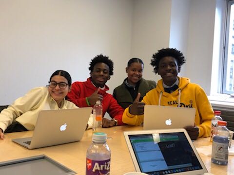 Cristo students posing during development