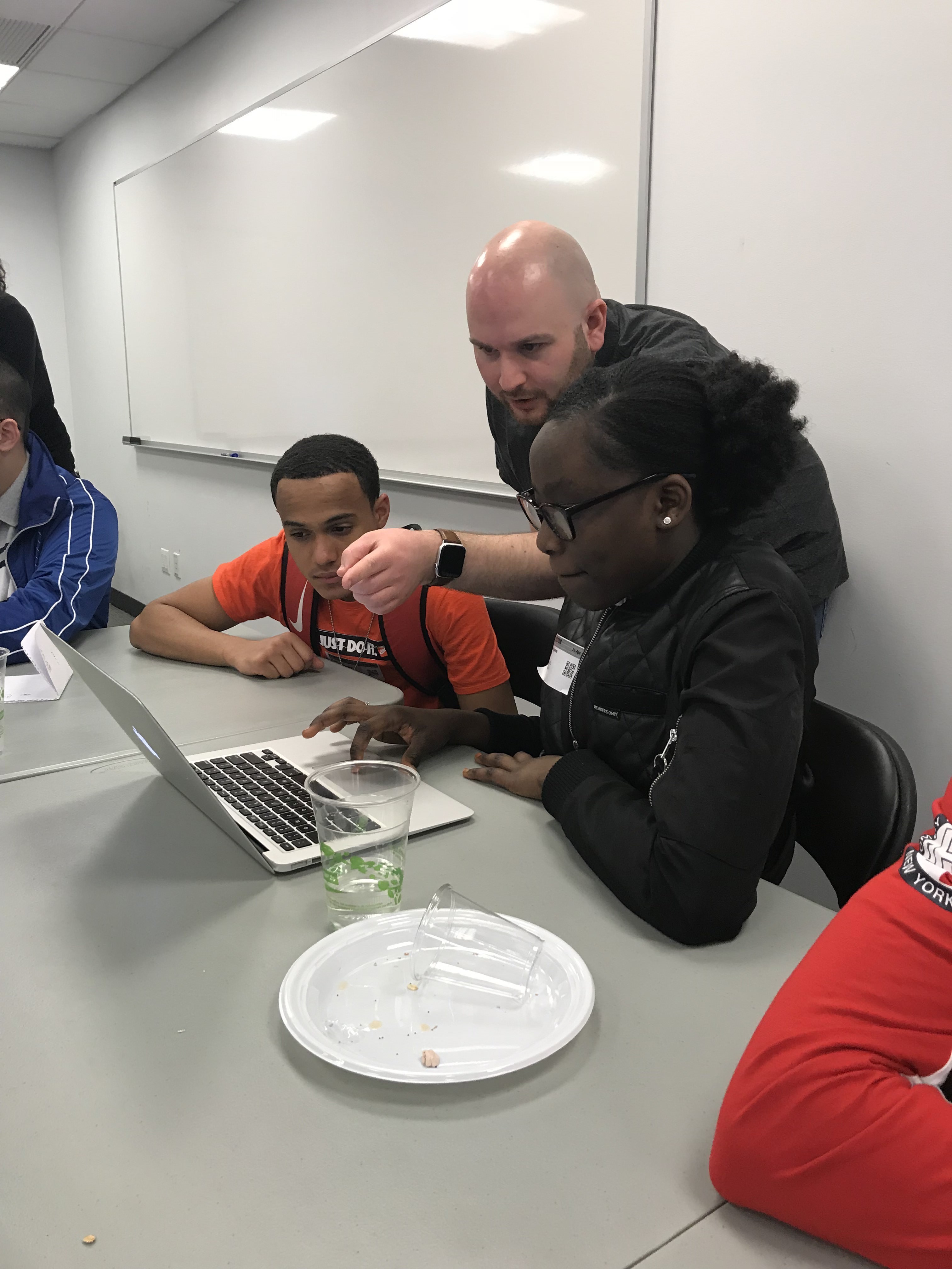 Tom Elliot helpings kids