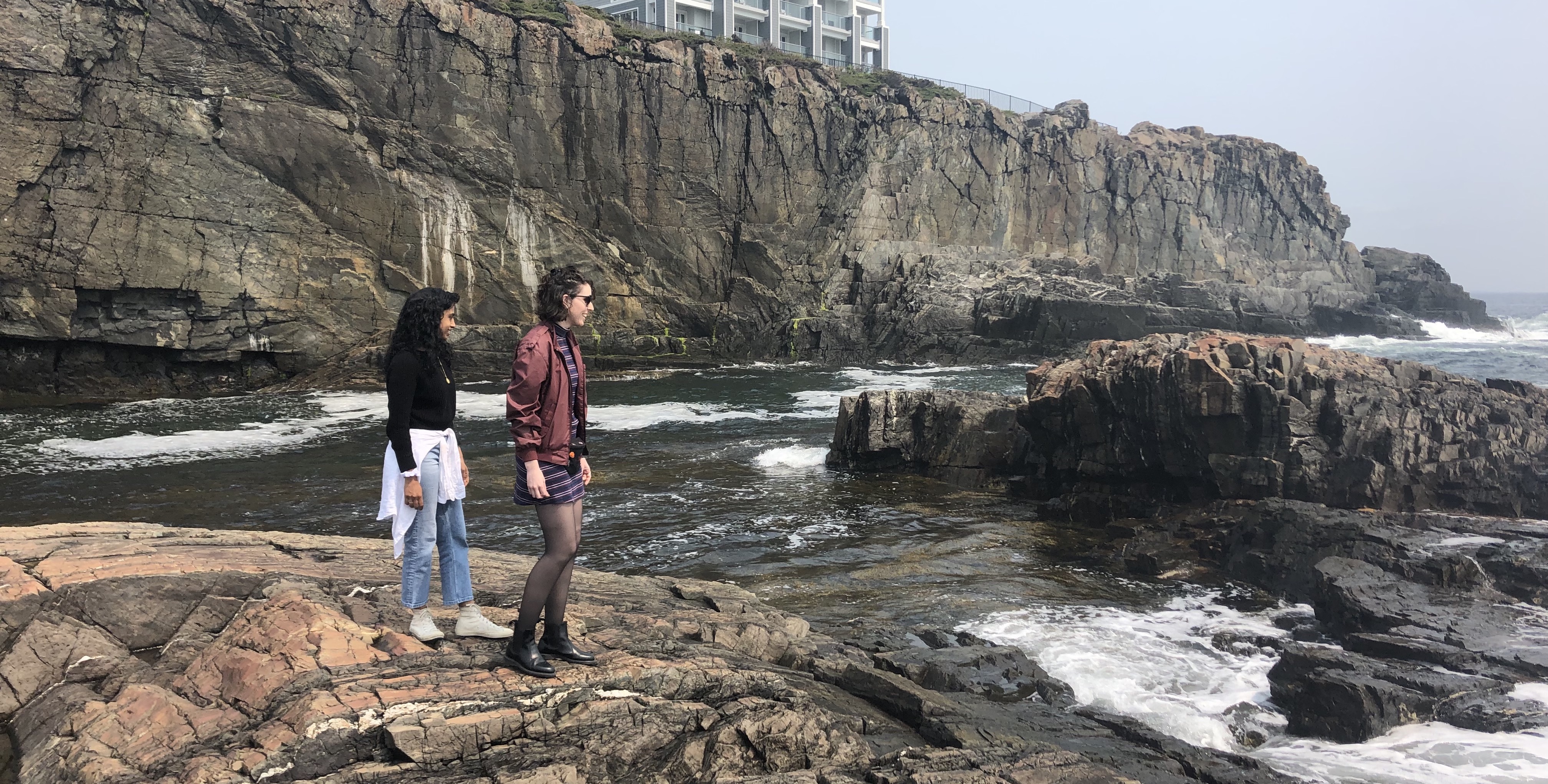 Engineers Hanging Out Cliffside